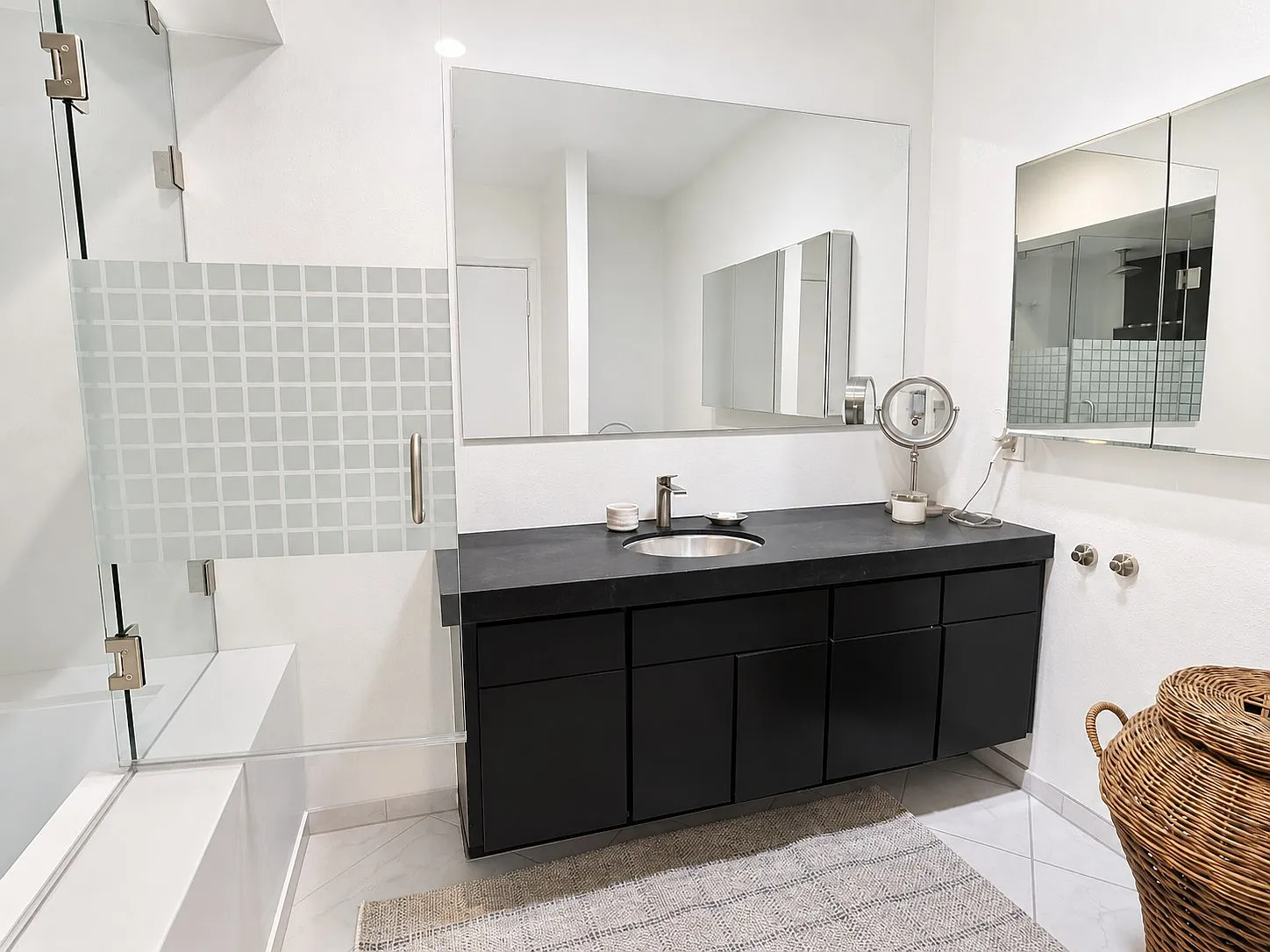 Bathroom vanity with black quartz counter, Point Loma condo