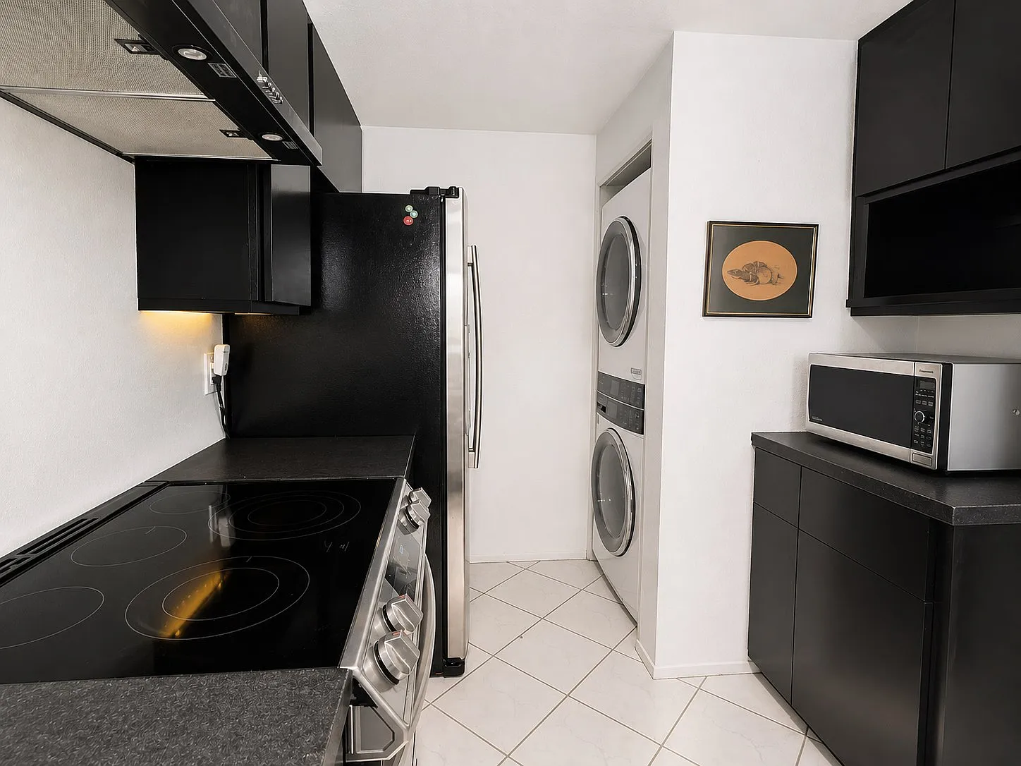 Kitchen with stainless appliances and in-unit washer and dryer, Point Loma