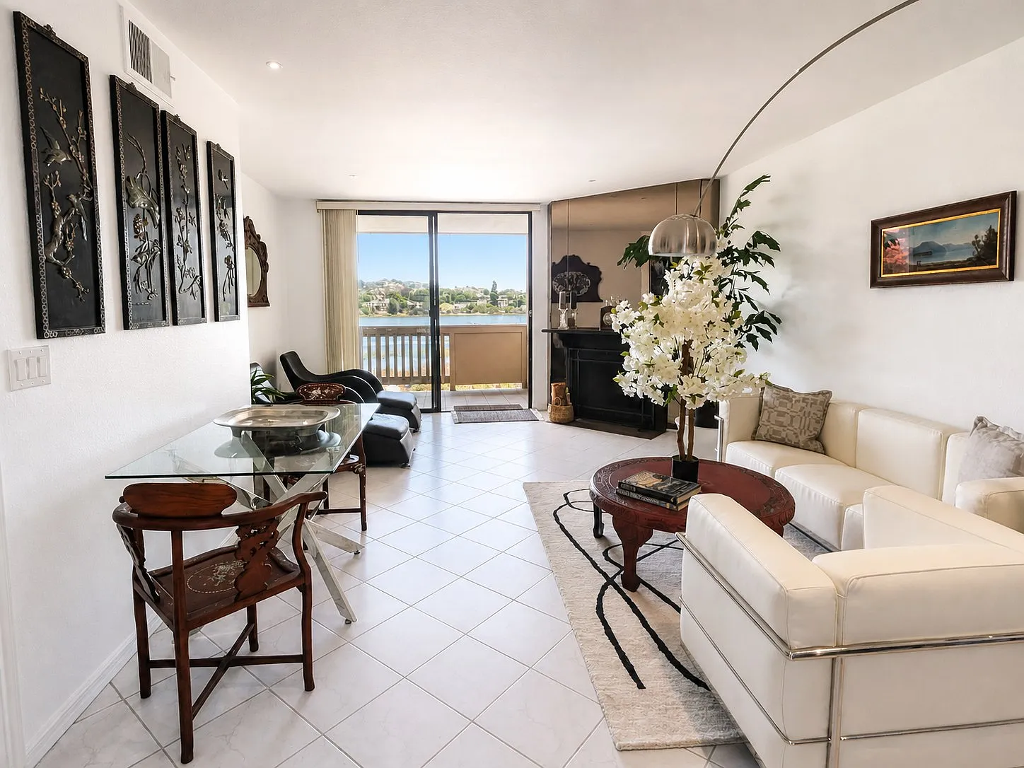 Open living and dining area with lagoon view, Point Loma condo