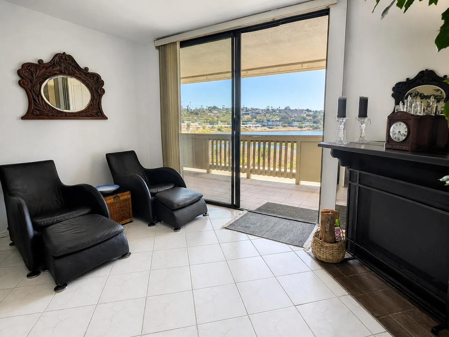 Living room seating area with fireplace and balcony, Point Loma